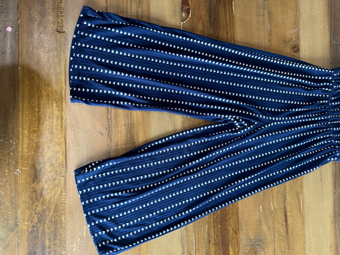 Soft Navy Jumpsuit with Ruffle Sleeve and Heart Print, Size 10